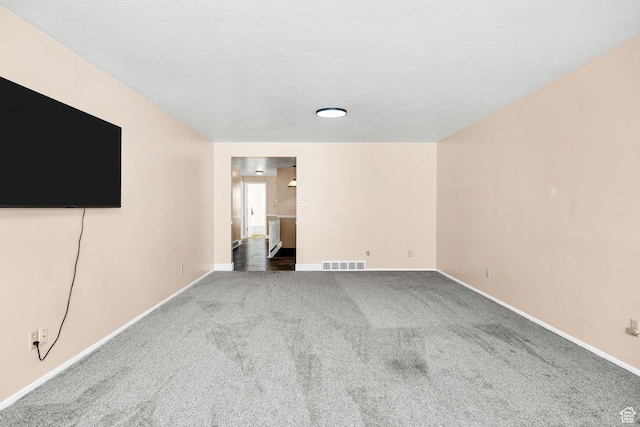 518 E Wendy Way S, Tremonton, UT 84337 - interior space featuring visible vents, carpet flooring, and baseboards