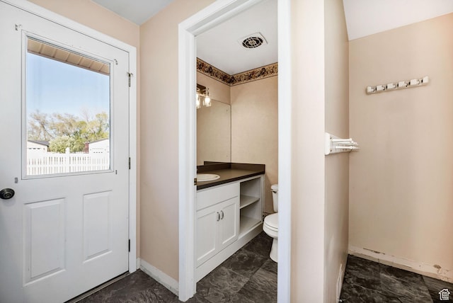 518 E Wendy Way S, Tremonton, UT 84337 - bathroom featuring visible vents, baseboards, vanity, toilet, and marble finish floor