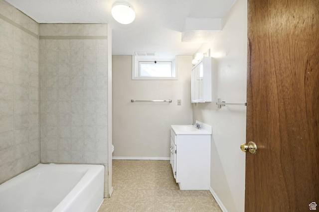 518 E Wendy Way S, Tremonton, UT 84337 - full bathroom with visible vents, vanity, tile patterned floors, toilet, and a tub to relax in