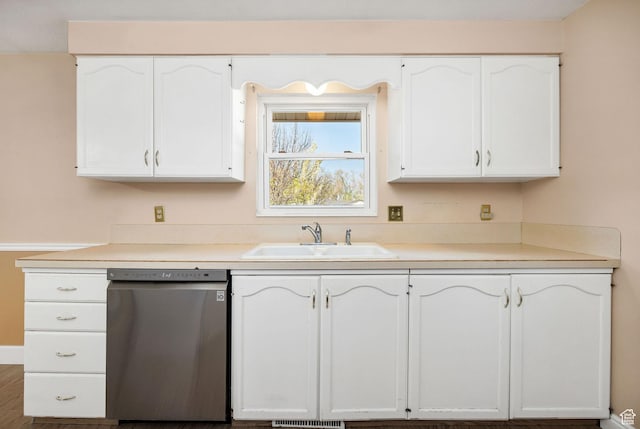 518 E Wendy Way S, Tremonton, UT 84337 - kitchen featuring stainless steel dishwasher, a sink, white cabinetry, and light countertops