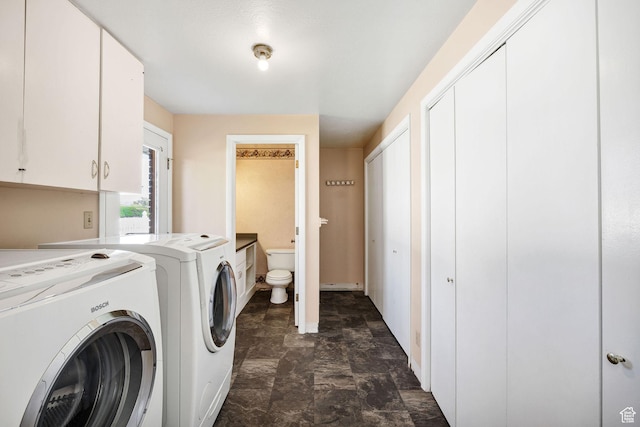 518 E Wendy Way S, Tremonton, UT 84337 - clothes washing area with stone finish floor, baseboards, laundry area, and washing machine and clothes dryer