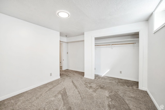 518 E Wendy Way S, Tremonton, UT 84337 - unfurnished bedroom featuring carpet floors, a textured ceiling, and baseboards