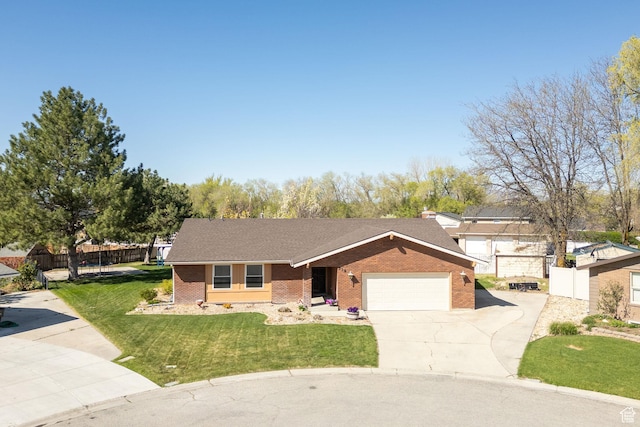 518 E Wendy Way S, Tremonton, UT 84337 - single story home featuring fence, a front yard, brick siding, an attached garage, and driveway