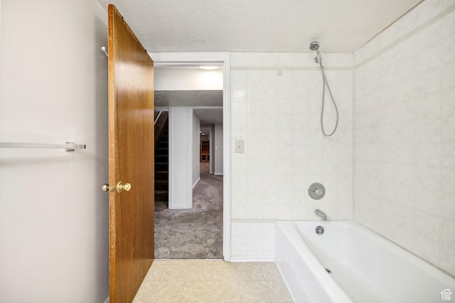 518 E Wendy Way S, Tremonton, UT 84337 - bathroom featuring a textured ceiling, tile patterned floors, and tub / shower combination