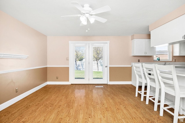 518 E Wendy Way S, Tremonton, UT 84337 - dining space with baseboards, a ceiling fan, light wood finished floors, and visible vents