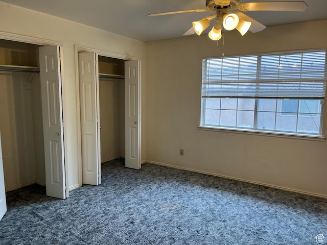 99 N 1850 W Unit 4, Cedar City, UT 84720 - unfurnished bedroom featuring carpet floors, baseboards, ceiling fan, and two closets