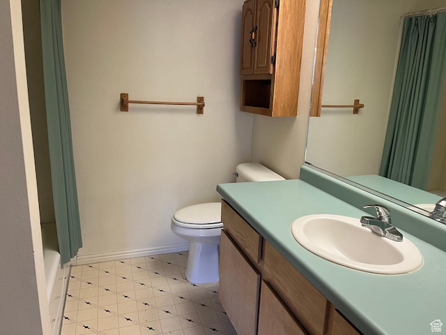 99 N 1850 W Unit 4, Cedar City, UT 84720 - bathroom featuring vanity, baseboards, tile patterned floors, and toilet