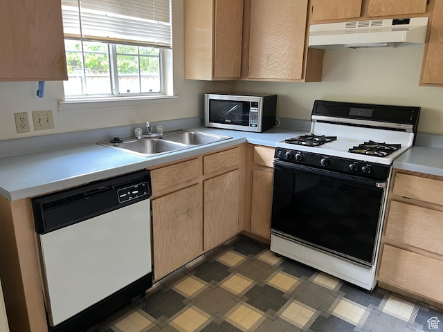 99 N 1850 W Unit 4, Cedar City, UT 84720 - kitchen featuring gas range, stainless steel microwave, under cabinet range hood, a sink, and dishwasher