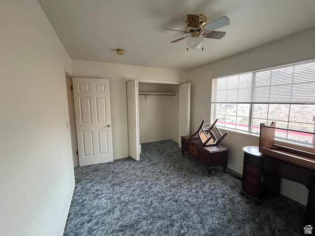 99 N 1850 W Unit 4, Cedar City, UT 84720 - bedroom featuring a ceiling fan, dark carpet, and a closet