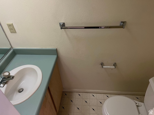 99 N 1850 W Unit 4, Cedar City, UT 84720 - half bathroom featuring vanity, baseboards, and toilet