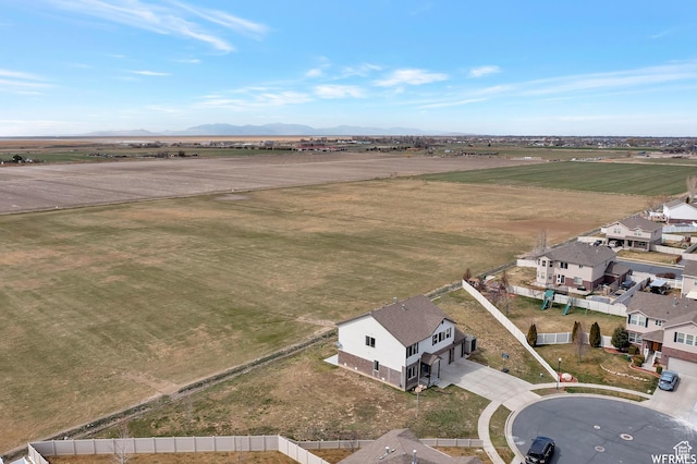 bird's eye view featuring a rural view and a mountain view