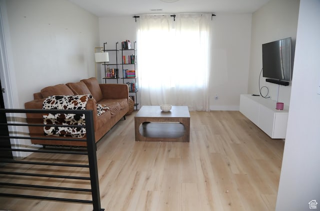 3596 W 2610 S, Syracuse, UT 84075 - living area with light wood finished floors and baseboards