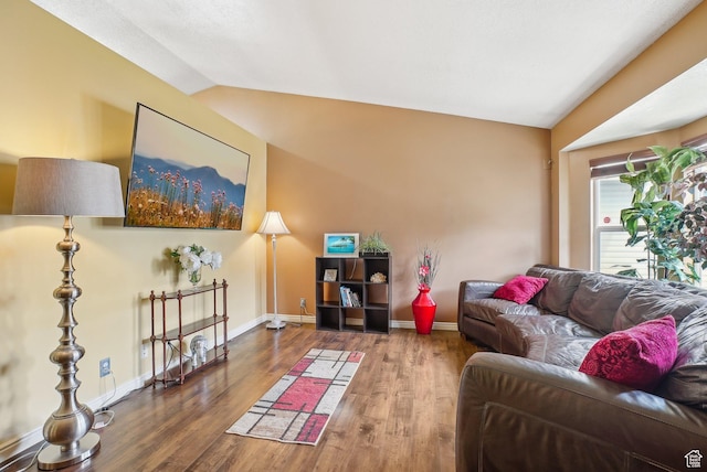 8564 S Laurel Oak Dr W, West Jordan, UT 84088 - living room with lofted ceiling, wood finished floors, and baseboards