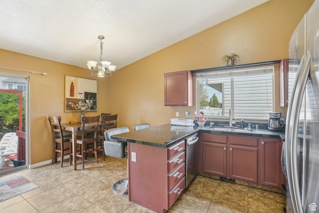 8564 S Laurel Oak Dr W, West Jordan, UT 84088 - kitchen with a sink, appliances with stainless steel finishes, lofted ceiling, a chandelier, and dark countertops
