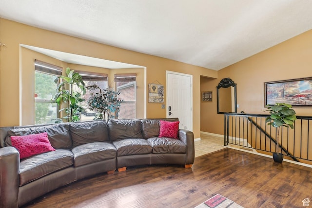8564 S Laurel Oak Dr W, West Jordan, UT 84088 - living room featuring wood finished floors, lofted ceiling, and baseboards