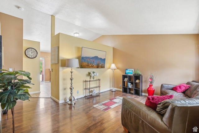 8564 S Laurel Oak Dr W, West Jordan, UT 84088 - living room with lofted ceiling, wood finished floors, and baseboards