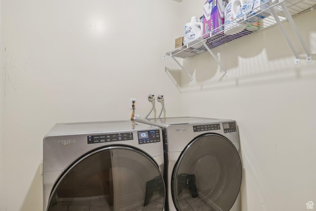 8564 S Laurel Oak Dr W, West Jordan, UT 84088 - clothes washing area with washer and clothes dryer and tile patterned floors