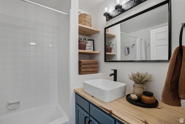 full bath featuring shower / tub combo with curtain and vanity