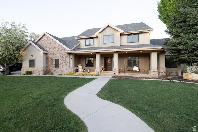 486 N 3500 W, Vernal, UT 84078 - view of front of property with a porch, a front lawn, board and batten siding, and roof with shingles