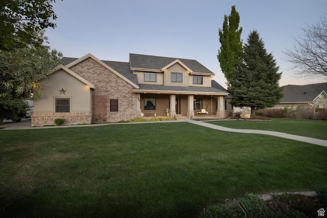 486 N 3500 W, Vernal, UT 84078 - view of front facade featuring covered porch and a front lawn