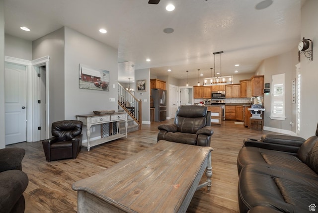 486 N 3500 W, Vernal, UT 84078 - living room featuring recessed lighting, baseboards, stairway, and light wood-style floors
