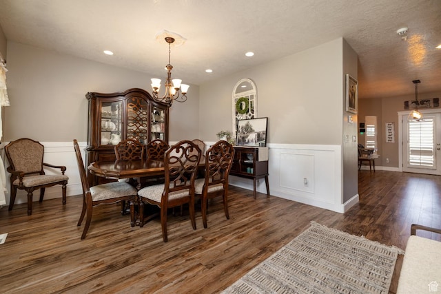486 N 3500 W, Vernal, UT 84078 - dining area with recessed lighting, dark wood finished floors, a wainscoted wall, and a notable chandelier