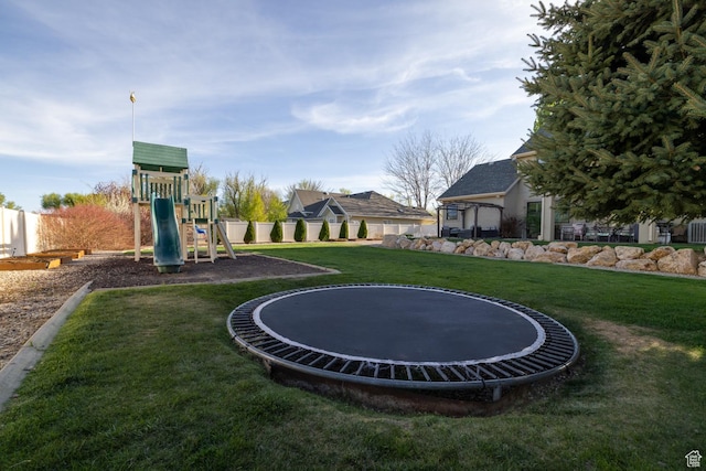 486 N 3500 W, Vernal, UT 84078 - view of yard featuring a playground, fence, and a trampoline