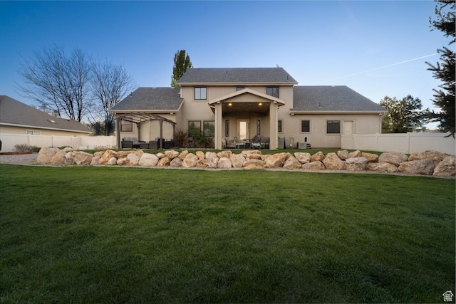 486 N 3500 W, Vernal, UT 84078 - view of front of house featuring fence, stucco siding, and a front lawn