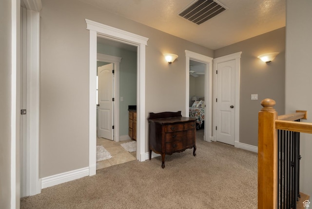 486 N 3500 W, Vernal, UT 84078 - corridor with visible vents, baseboards, carpet floors, and an upstairs landing