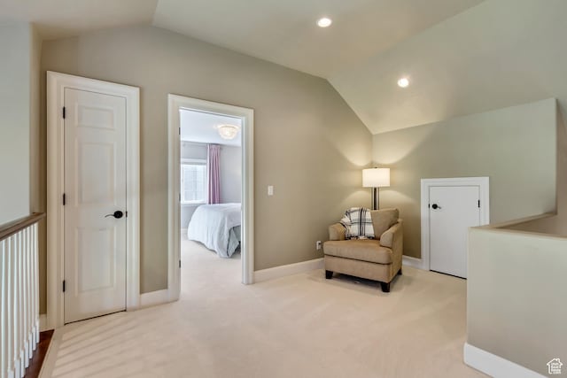 living area featuring carpet floors, recessed lighting, baseboards, and lofted ceiling