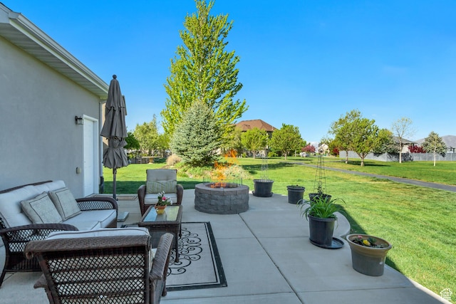 view of patio / terrace with a fire pit