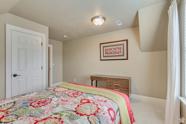 bedroom with carpet and visible vents