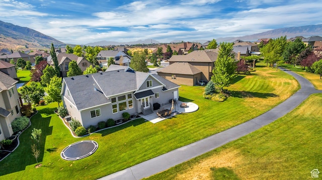 aerial view with a mountain view and a residential view