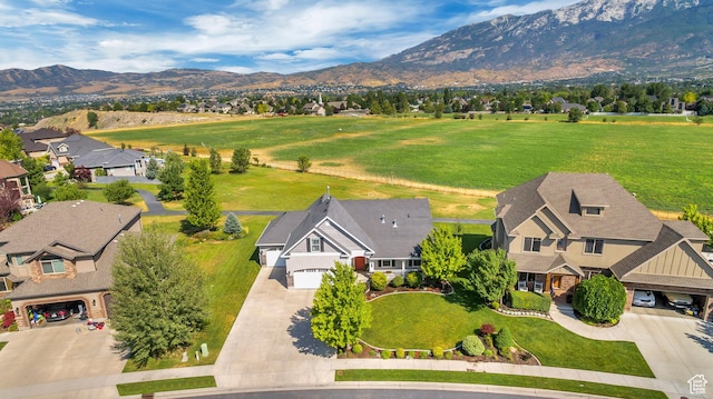 aerial view with a mountain view and a residential view