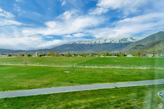 mountain view featuring a rural view