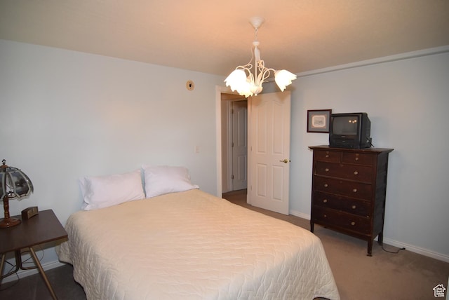 183 E Ama Fille Ln N, Elk Ridge, UT 84651 - carpeted bedroom featuring a chandelier and baseboards