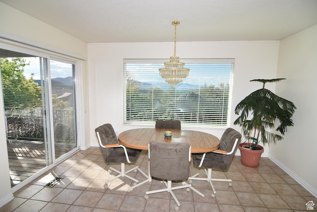 183 E Ama Fille Ln N, Elk Ridge, UT 84651 - dining room with a chandelier, plenty of natural light, and baseboards