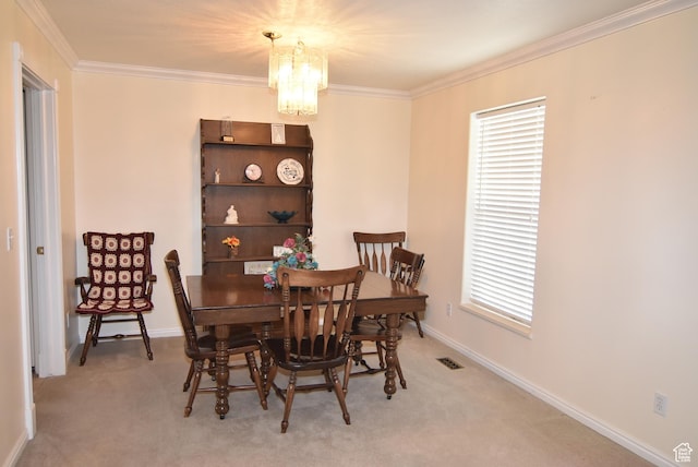 183 E Ama Fille Ln N, Elk Ridge, UT 84651 - carpeted dining room with a chandelier, ornamental molding, and baseboards