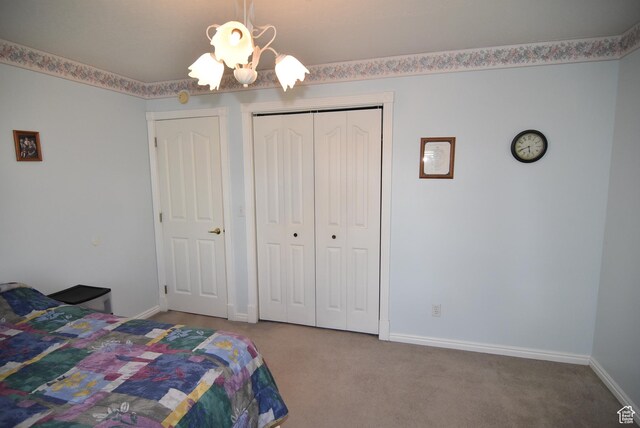 183 E Ama Fille Ln N, Elk Ridge, UT 84651 - bedroom featuring carpet floors, a closet, and baseboards