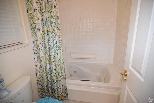 183 E Ama Fille Ln N, Elk Ridge, UT 84651 - bathroom with a combined bath / shower with jetted tub and toilet