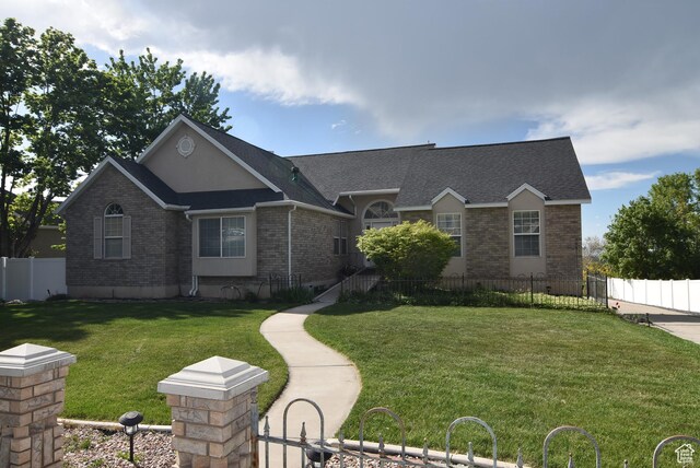 183 E Ama Fille Ln N, Elk Ridge, UT 84651 - single story home with brick siding and a shingled roof