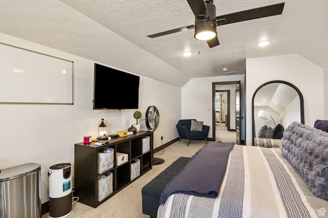 423 W Red Wolf Dr, Saratoga Springs, UT 84045 - bedroom with lofted ceiling, a ceiling fan, a textured ceiling, baseboards, and light carpet