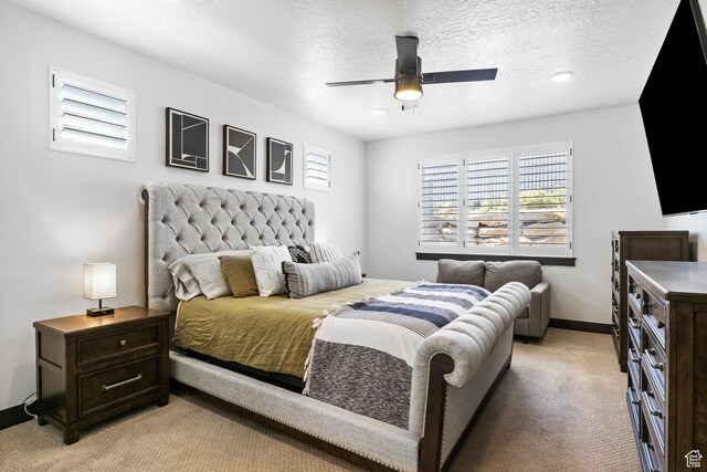 423 W Red Wolf Dr, Saratoga Springs, UT 84045 - bedroom with multiple windows, light carpet, baseboards, and a ceiling fan