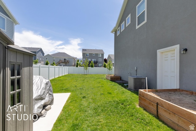2034 E 970 N, Spanish Fork, UT 84660 - view of yard with central air condition unit, a residential view, and a vegetable garden