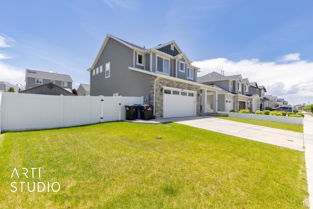 2034 E 970 N, Spanish Fork, UT 84660 - view of front of house featuring a garage, concrete driveway, stone siding, and a residential view