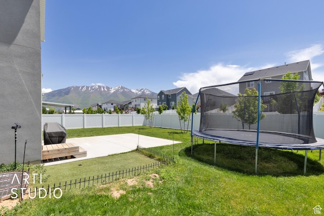 2034 E 970 N, Spanish Fork, UT 84660 - view of yard featuring a trampoline, a patio, a residential view, and a mountain view