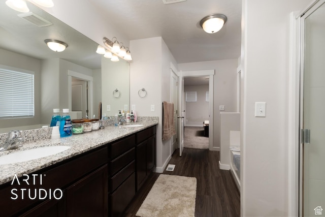 2034 E 970 N, Spanish Fork, UT 84660 - full bath with wood finished floors, double vanity, and baseboards