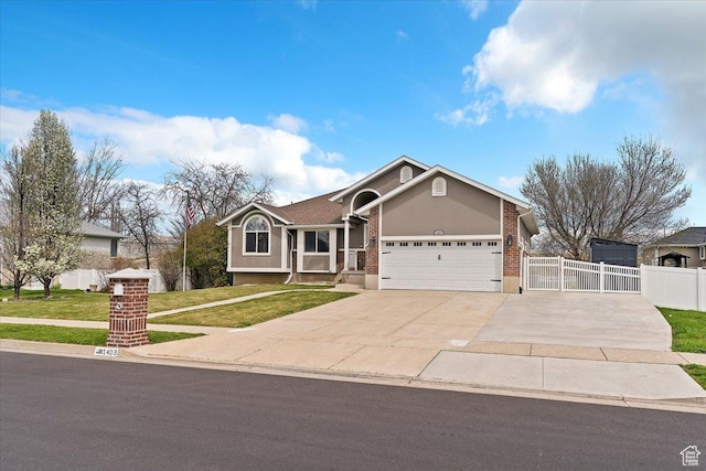 craftsman-style house with a garage, fence, a front lawn, concrete driveway, and brick siding