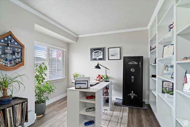 office featuring crown molding, a textured ceiling, wood finished floors, and baseboards