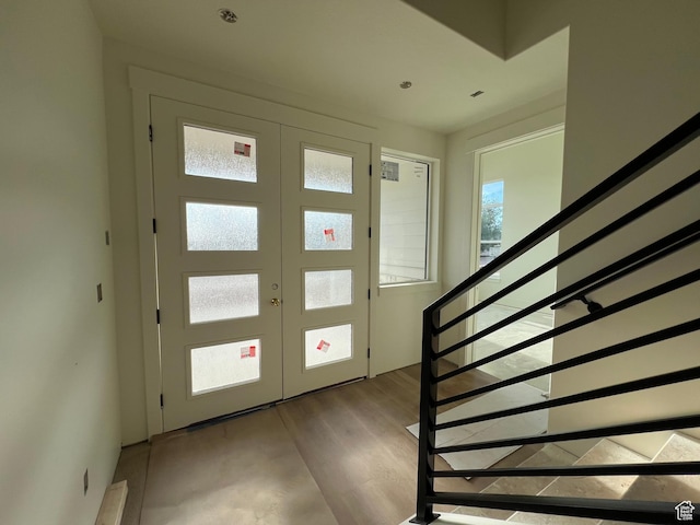 1148 N 1875 E Unit 2, Layton, UT 84040 - entrance foyer featuring stairs, wood finished floors, and french doors